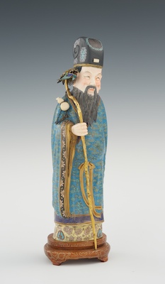 A Cloisonne Figure with Ivory