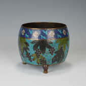 A CLOISONNE THREE - LEGGED CIR