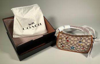 A Coach Swinger in textured