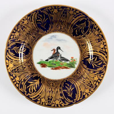 A Coalport blue ground plate, circa