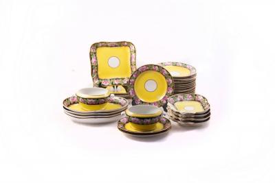 A Coalport yellow ground part