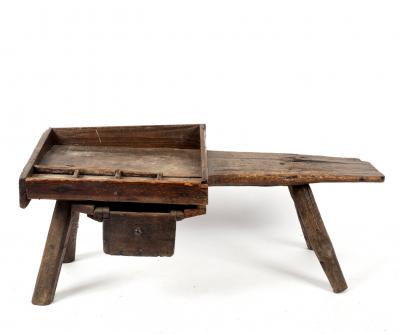 A cobbler's rustic elm bench,