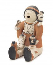 A Cochiti Storyteller with fiv