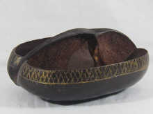 A coco de mer shell cut to form a