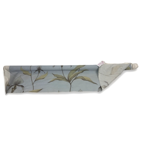 A Cole & Son roll of fabric.