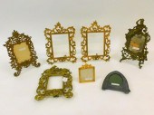 A COLLECTION OF (7) ORNATE MET