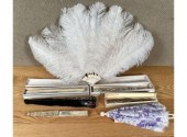A collection of antique fans,