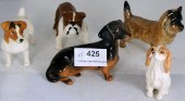 A collection of Beswick Dogs t