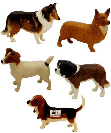 A collection of Beswick Dogs