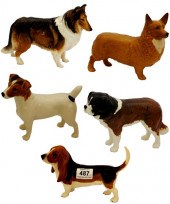 A collection of Beswick Dogs c