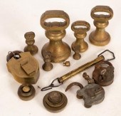 A collection of brass pillar w