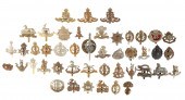 A COLLECTION OF CAP BADGES, MA