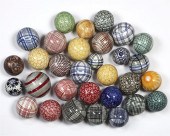 A COLLECTION OF CARPET BALLSA