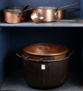 A COLLECTION OF COPPER POTS A