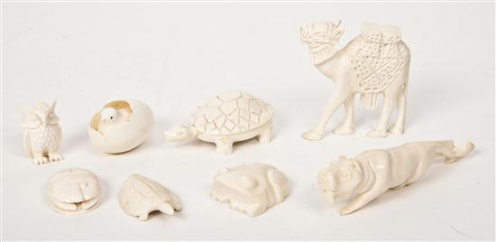 A Collection of Eight Carved