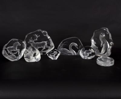 A collection of eight clear glass