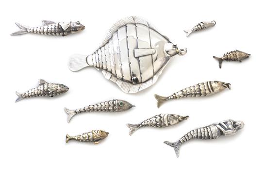 A Collection of Eight Silver or