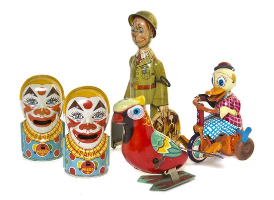 A Collection of Five Pressed Tin