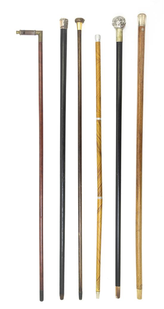 A Collection of Five Walking Sticks