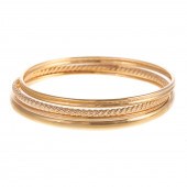 A COLLECTION OF FOUR BANGLES I
