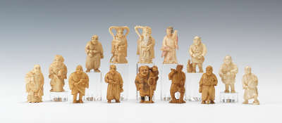 A Collection of Fourteen Carved