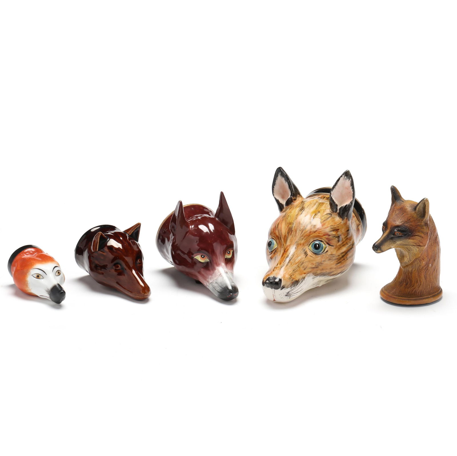 A COLLECTION OF FOX HEAD FORM
