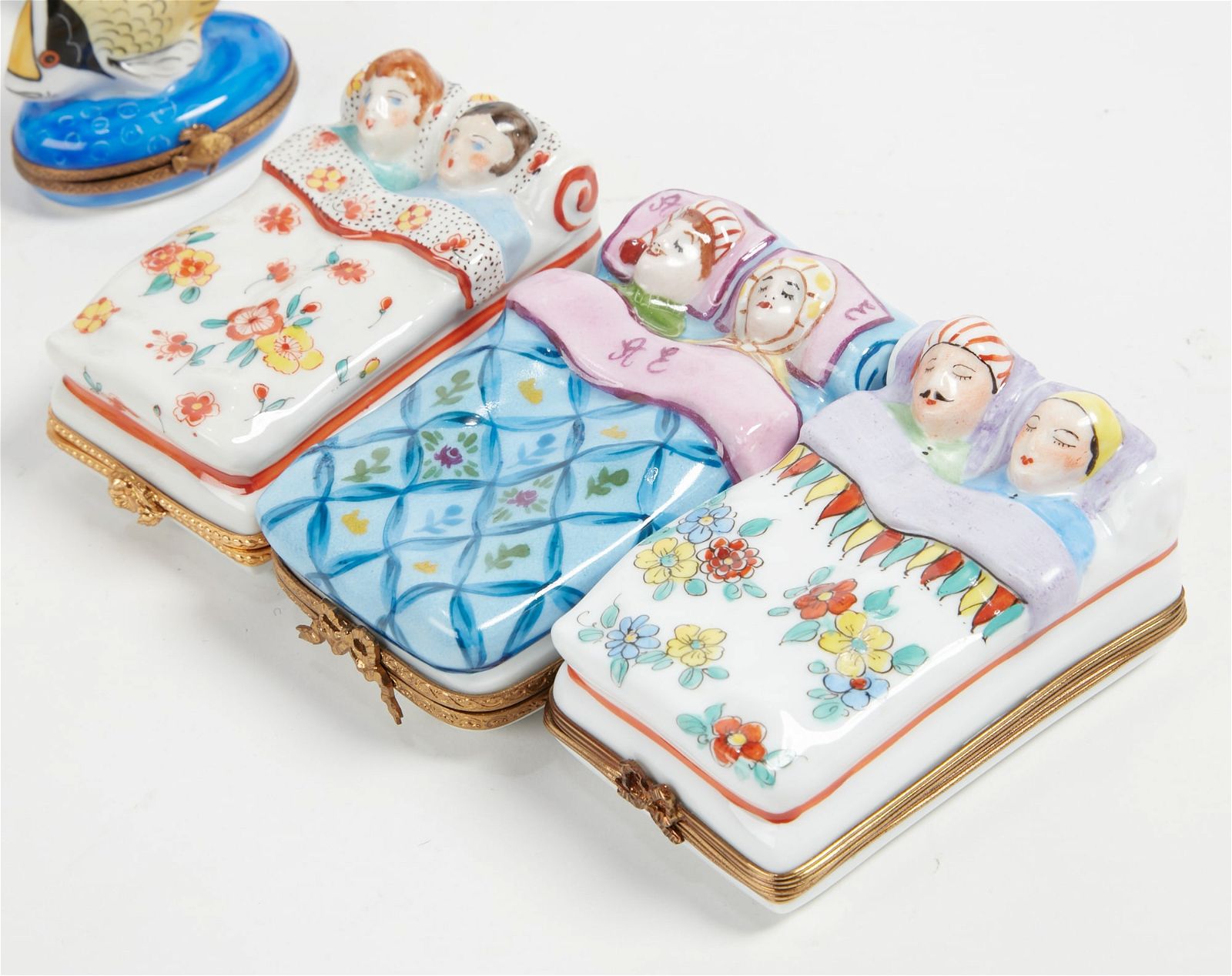 A COLLECTION OF GILT LIMOGES