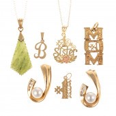 A COLLECTION OF GOLD PENDANTS