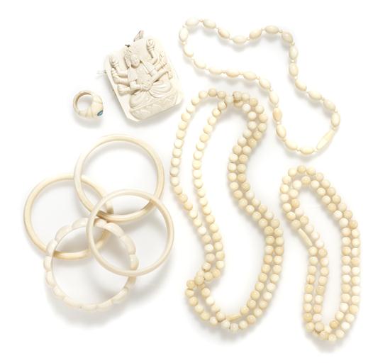 * A Collection of Ivory Jewelry