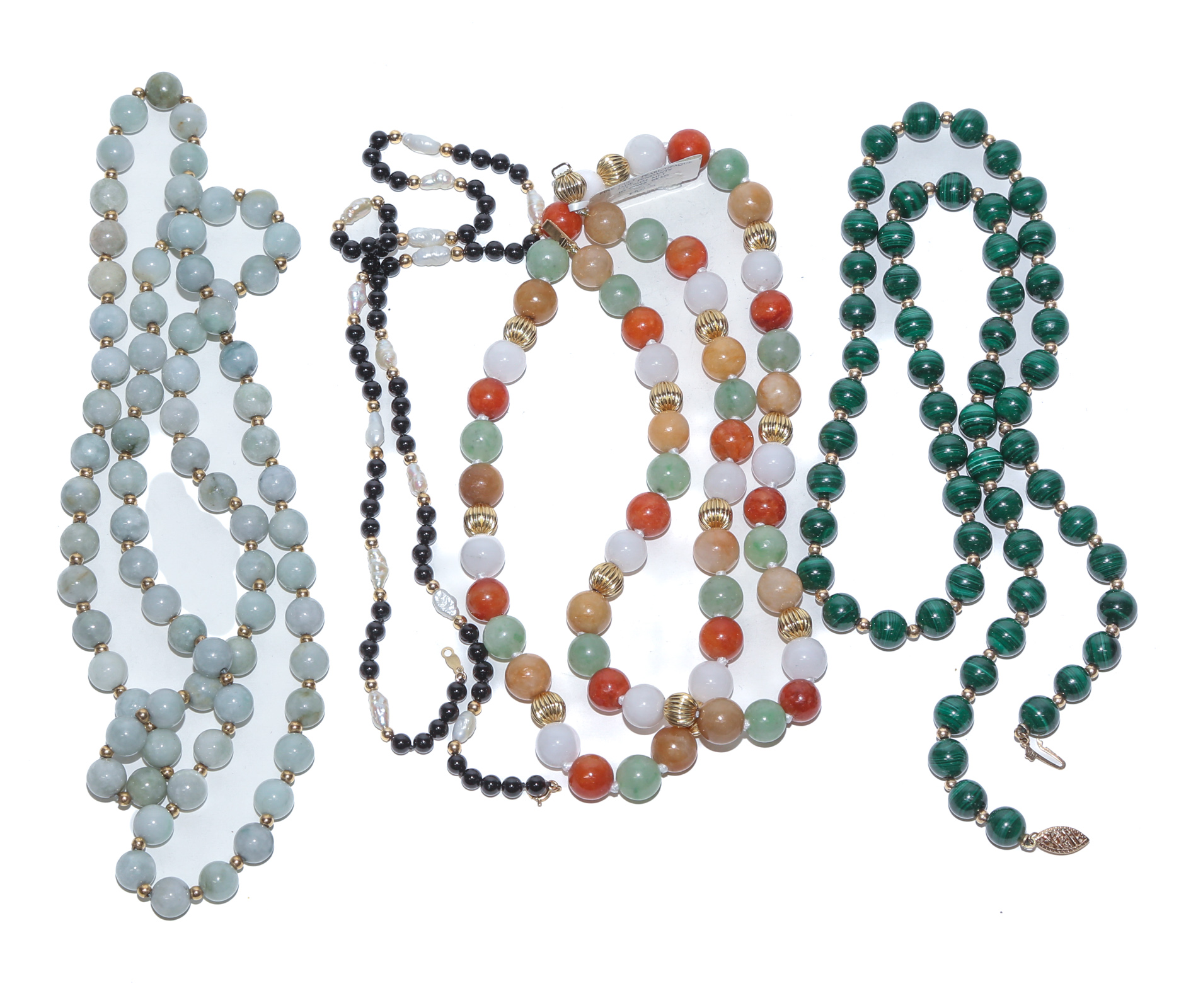 A COLLECTION OF JADE, MALACHITE &