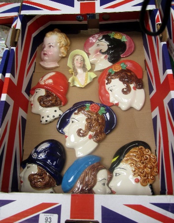 A collection of Lady Wall Plaques
