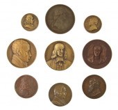 A Collection of Nine Bronze Me