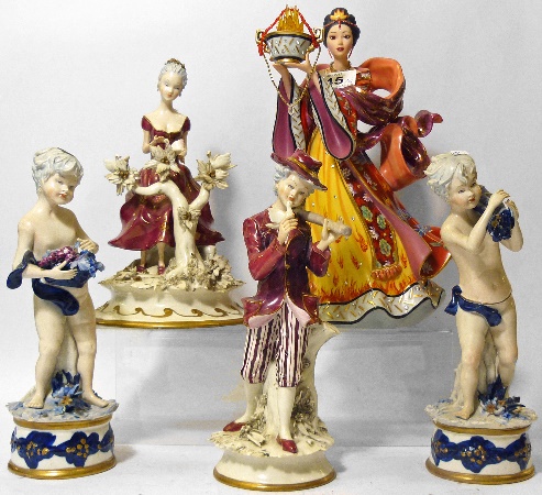 A Collection of Porcelain Figures