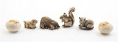 * A Collection of Six Ivory Ne