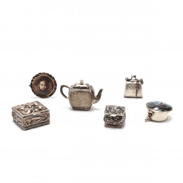 A COLLECTION OF SIX DIMINUTIVE