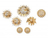 A COLLECTION OF SUN MOTIF JEWE