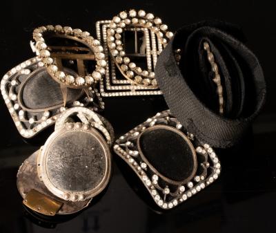 A collection of ten belt buckles,