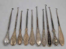 A collection of ten button hooks