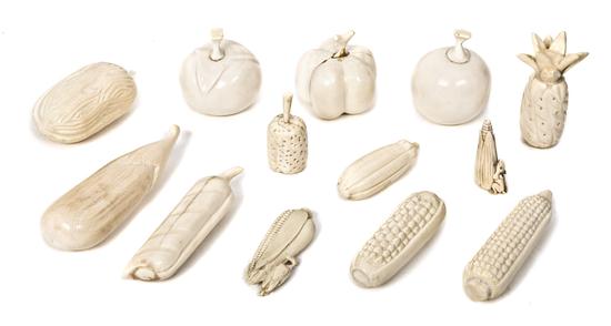 A Collection of Thirteen Carved