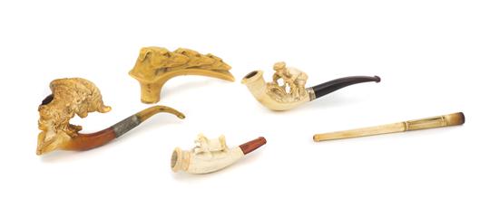 A Collection of Three Carved