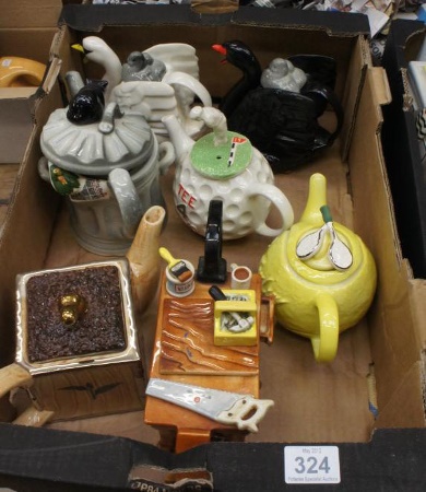 A collection of various Tea Pots by