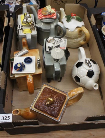 A collection of various Tea Pots by