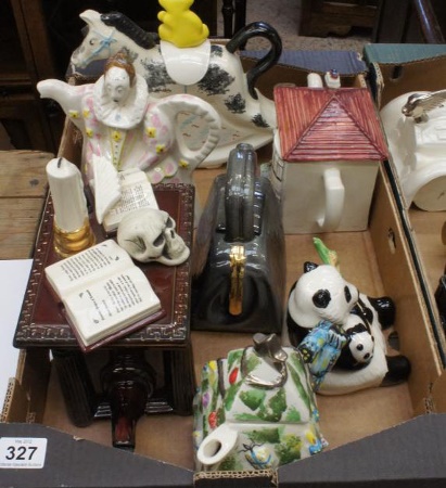 A collection of various Tea Pots by