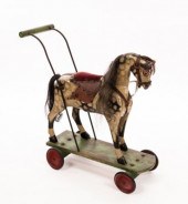 A Collinson push along horse,