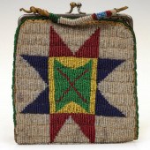 A COMMERCIALLY MADE PURSE WITH