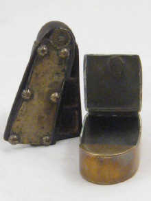 A compartmented brass mounted