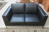A CONTEMPORARY BLACK LEATHER L