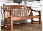 A contemporary carved teak 'Ch