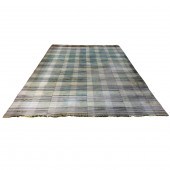 A CONTEMPORARY FLAT WEAVE CARP