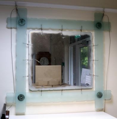 A contemporary frosted glass framed